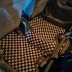 Checkered car floor mat in a vehicle JDM