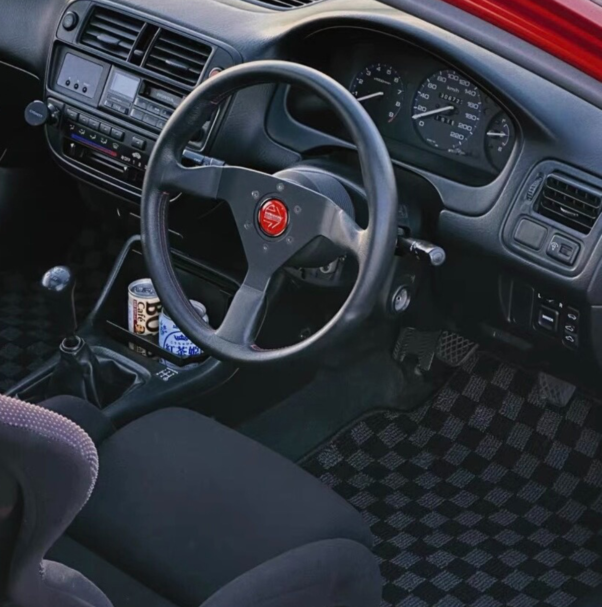 EK9 Civic Type R interior with JDM checkered floor mats and red momo steering wheel